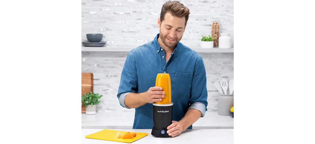 Man juicing with Nutribullet Pro Plus