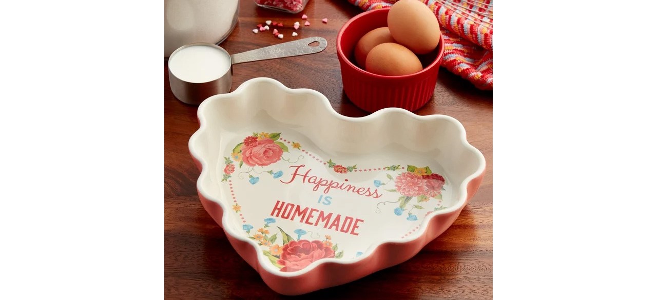 The Pioneer Woman Heart-Shaped Ceramic Baking Dish on table