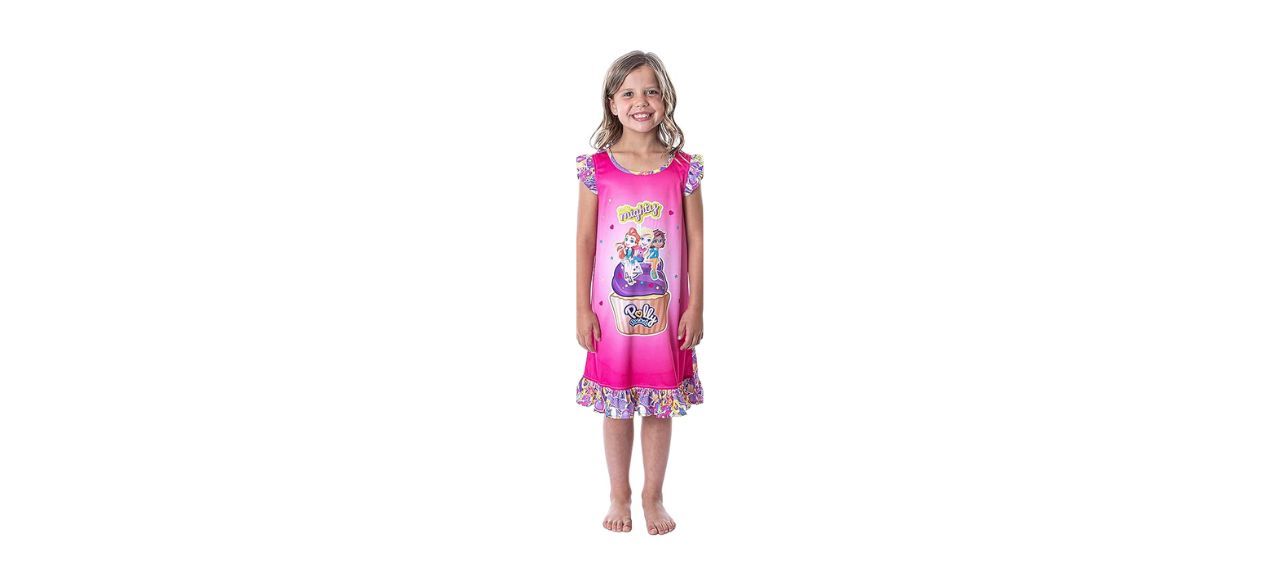 a child wearing a pink Intimo Polly Pocket Toys Mighty Kids Nightgown