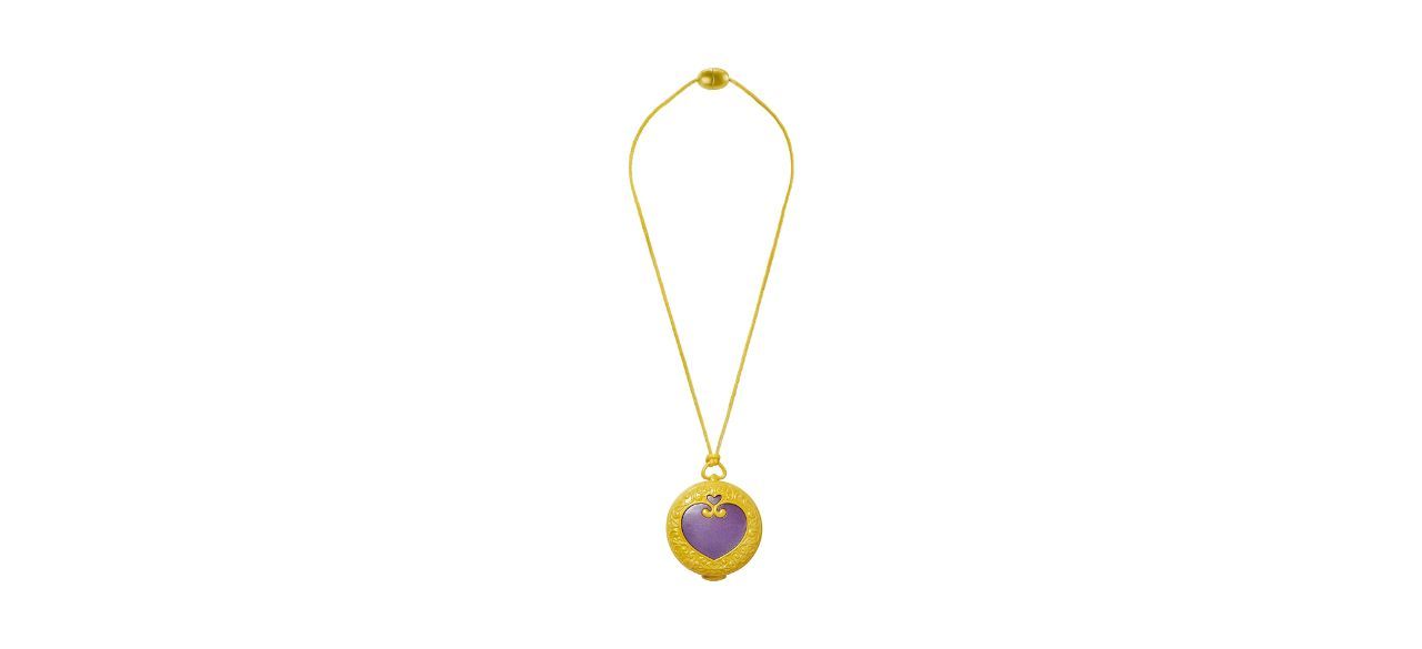 purple heart-shaped plastic pendant on a gold-colored fabric string