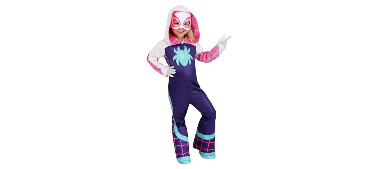 A little girl dressed in a Spider-Gwen costume