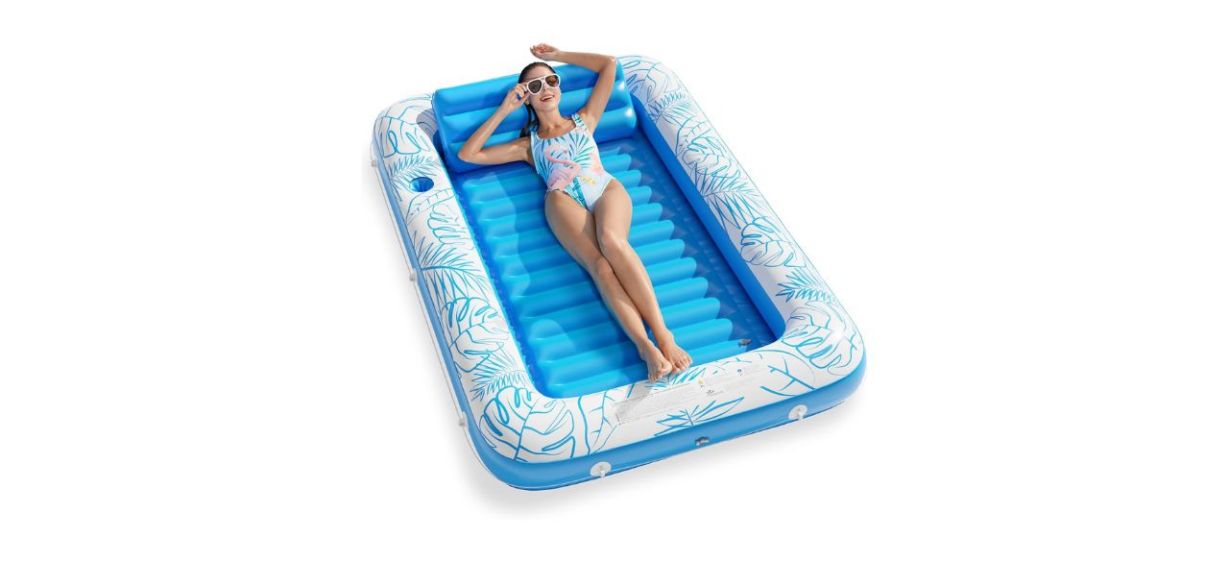 woman in swimsuit lying on a blue Jasonwell Inflatable Tanning Pool Lounger Float woman in swimsuit lying on a blue Jasonwell Inflatable Tanning Pool Lounger Float