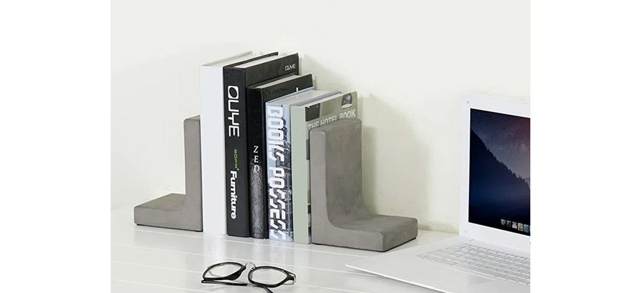 17 Stories Concrete Non-Skid Bookends on desk next to laptop and reading glasses