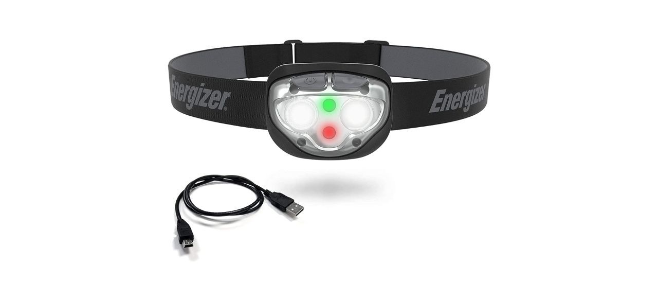 a black headlamp with green, red and white lights