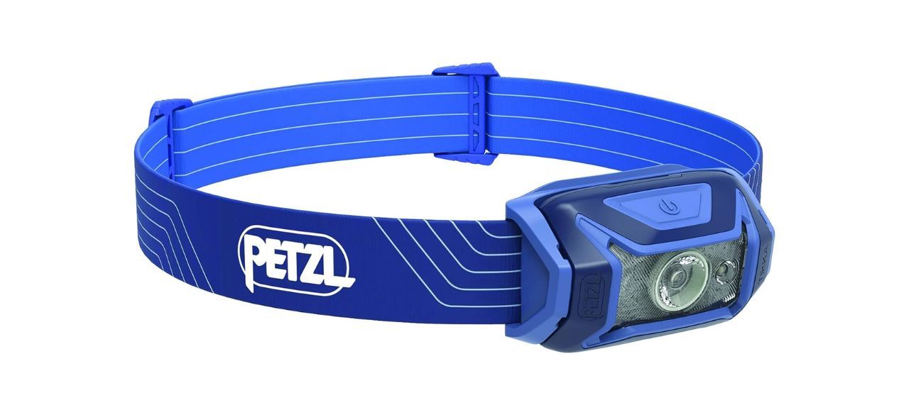 A blue headlamp with an elastic band to go around the head