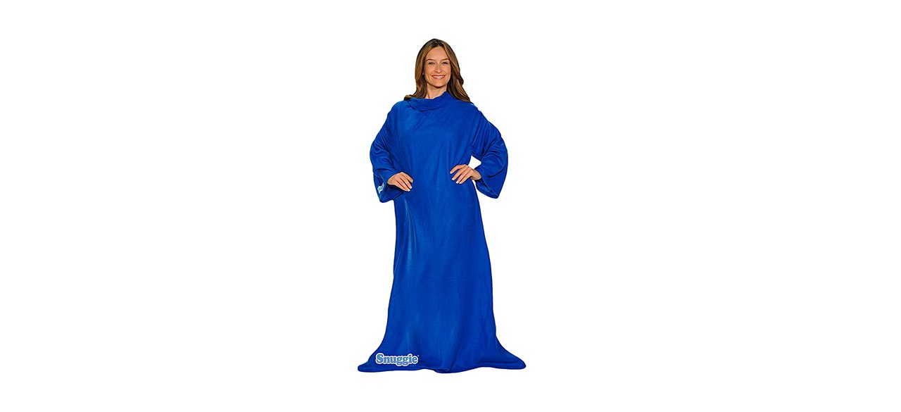 person wearing a bright blue blanket with sleeves