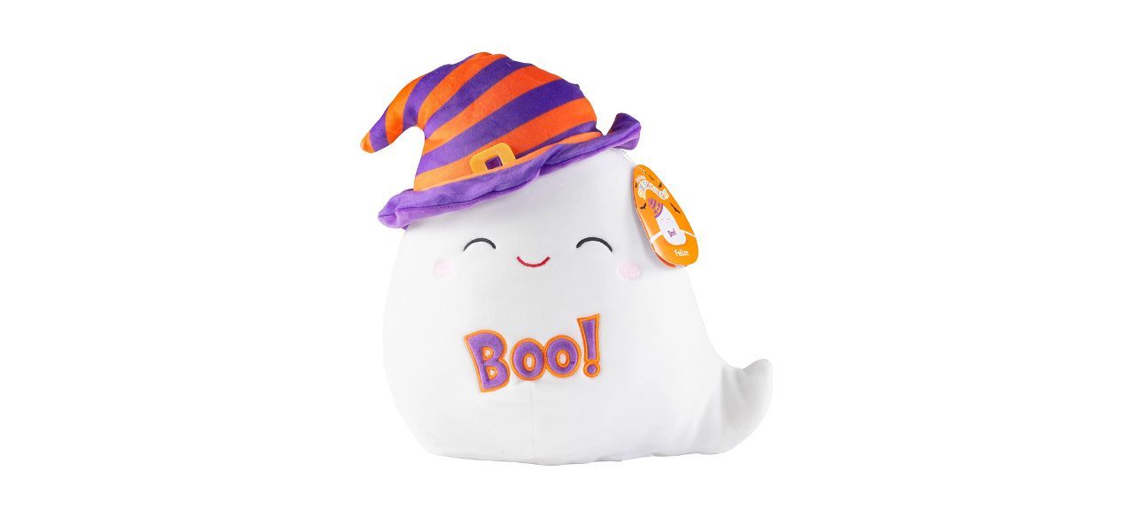 A white ghost plushie that's smiling and is wearing a purple and orange striped witch hat. The ghost's body says "boo" on it.