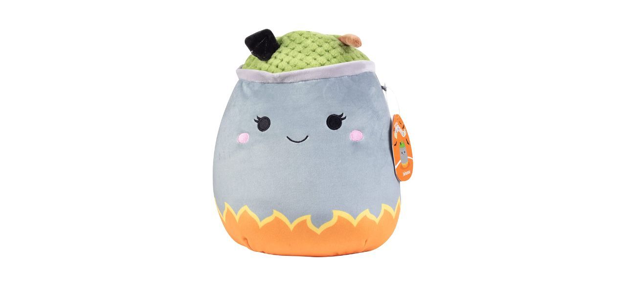 A smiling plush cauldron with green plush bubbles on the top