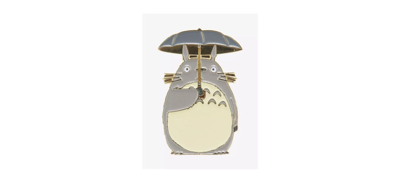 enamel pin of Studio Ghibli character Totoro holding an umbrella