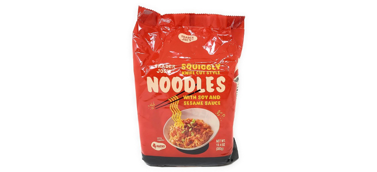 Bag of Trader Joe's Squiggly Knife Cut Noodles with Soy & Sesame Sauce on white background