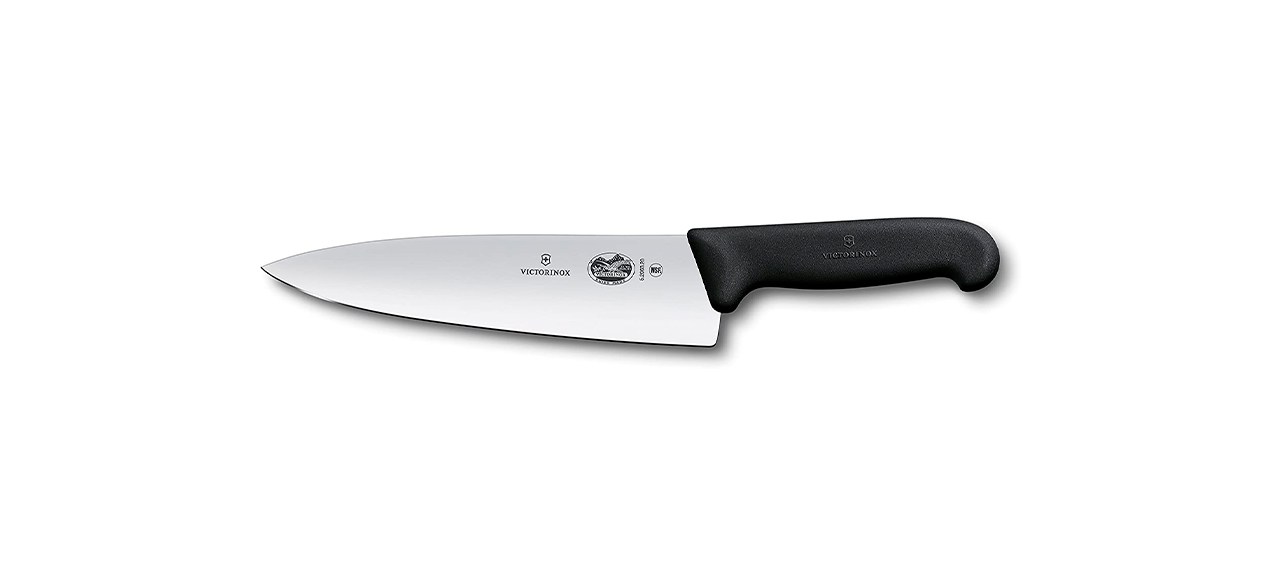 A chef's knife with a black plastic handle