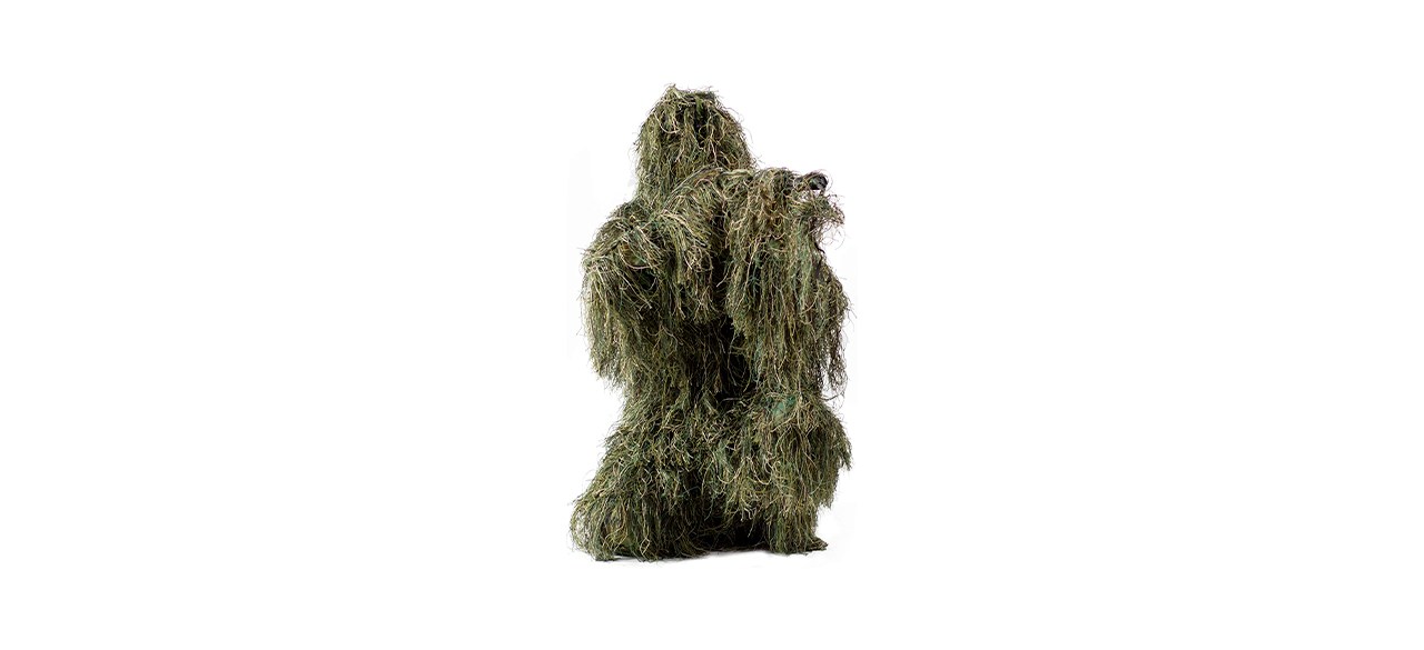 person wearing green mossy ghillie suit