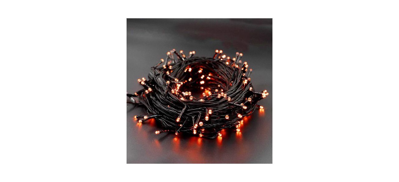 a large string of small orange fairy lights