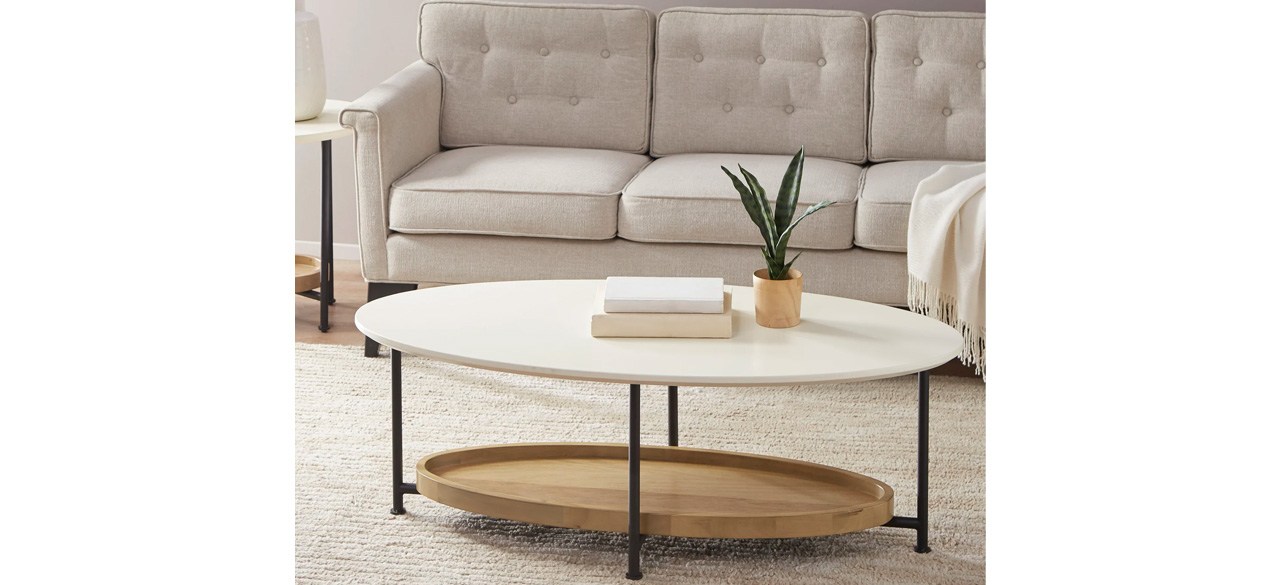 Wade Logan Alasteir Coffee Table in front of couch in living room