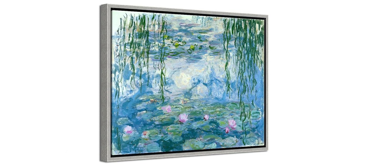 a framed replica of Monet's water lilies painting