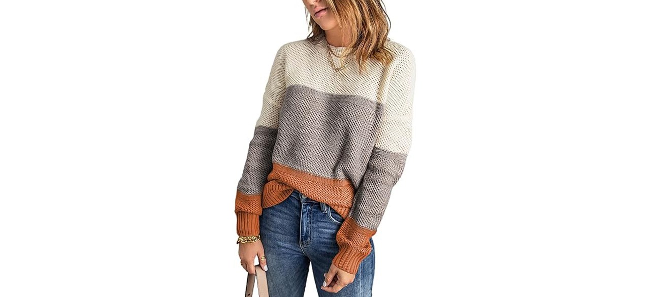 Woman wearing Dokotoo Womens Color Block Sweater on white background
