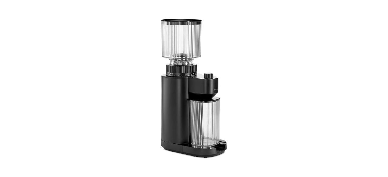 A coffee bean grinder with a clear top part