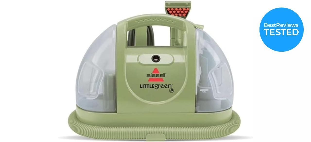 Woman cleaning carpet with Bissell Little Green Multi-Purpose Portable Carpet and Upholstery Cleaner