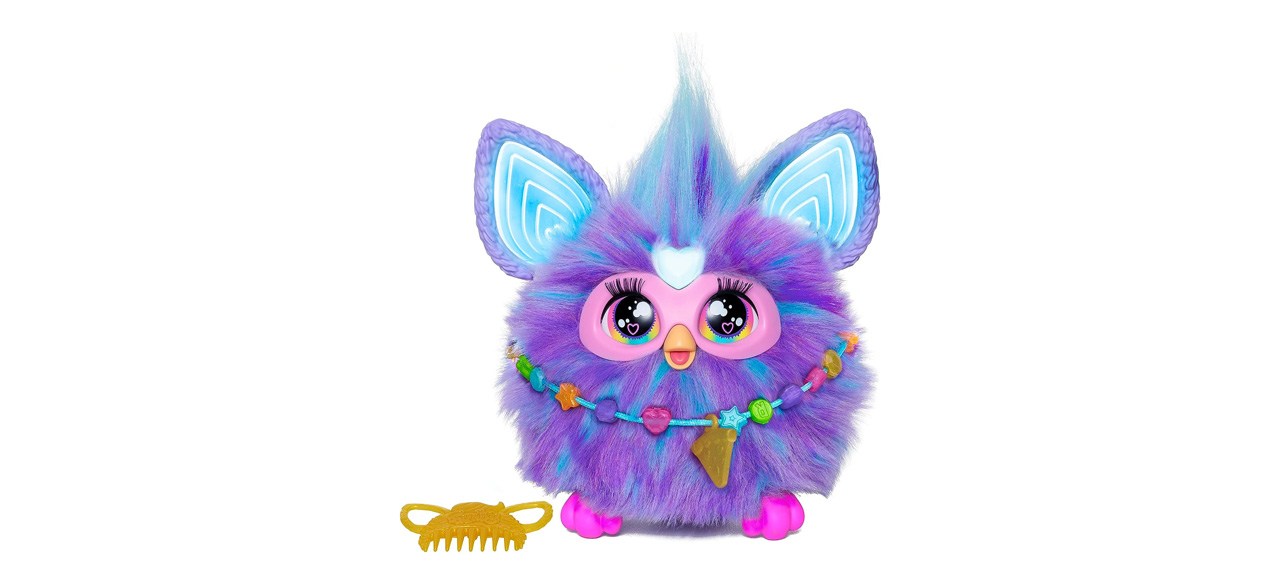 Purple, pink and aqua Furby on white background