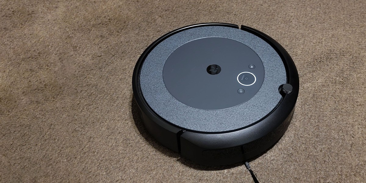 Roomba cleaning light beige carpet