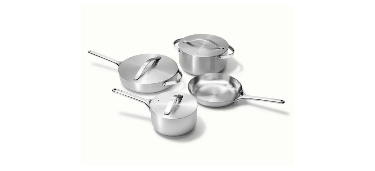 Caraway cookware set of four pots and pans on white background