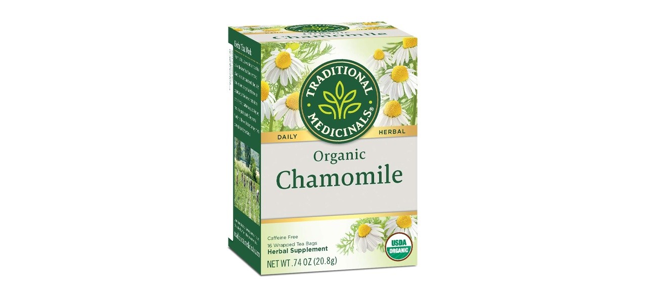 A box of tea bags. It's green and white with daisy-looking flowers on it. Text reads: "Traditional Medicinals Daily Herbal Organic Chamomile. Caffeine Free. 16 wrapped tea bags. Herbal supplement."