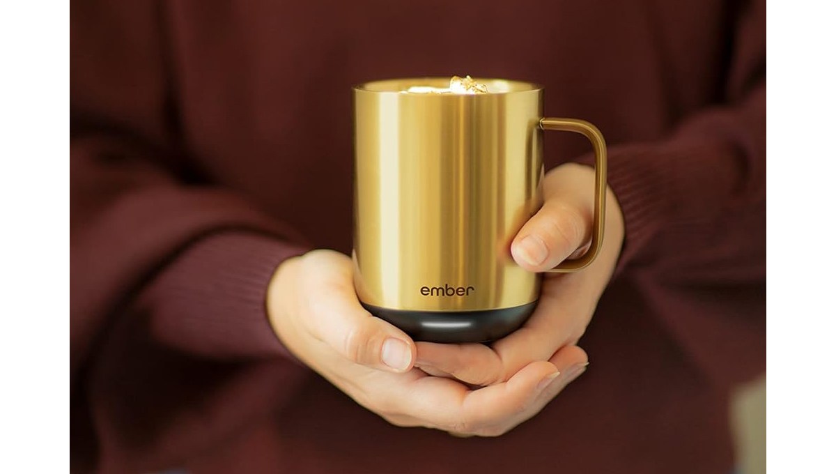 A closeup of hands holding an Ember Temperature Control Smart Mug 2.