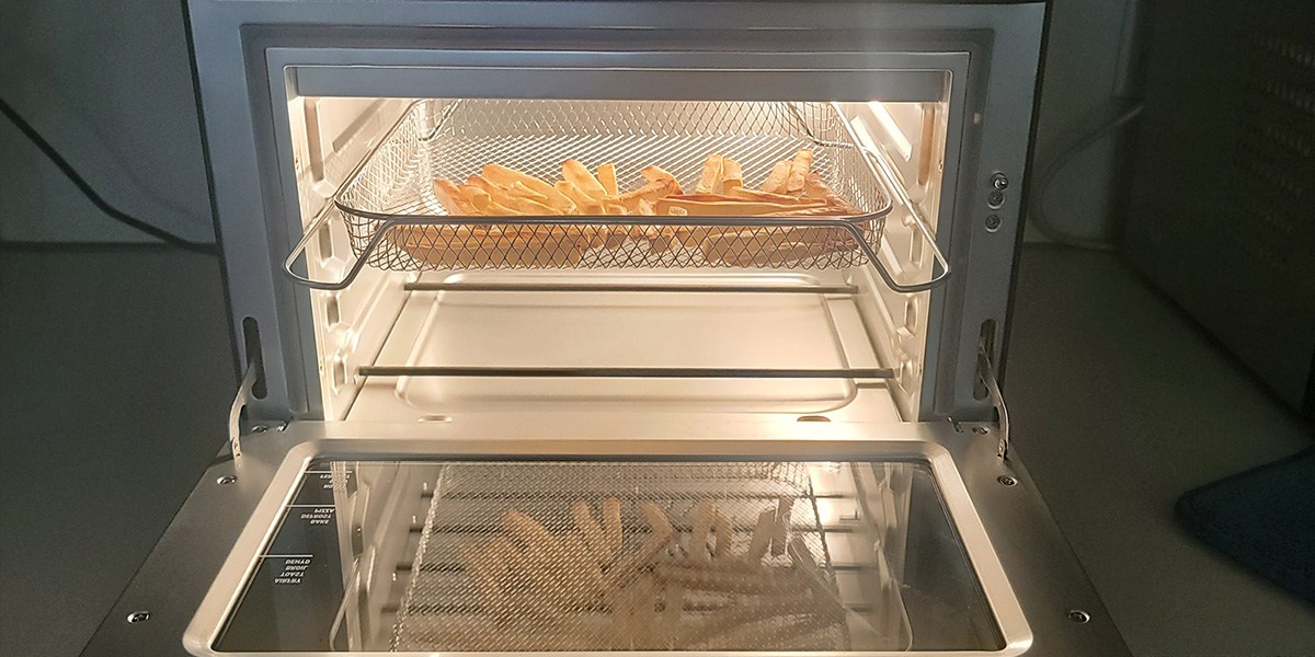 Air fryer with fries inside