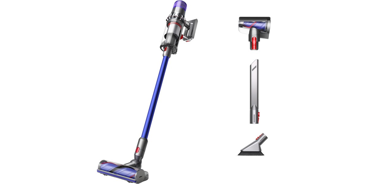 The Dyson V11 Origin stick vacuum next to three included attachments