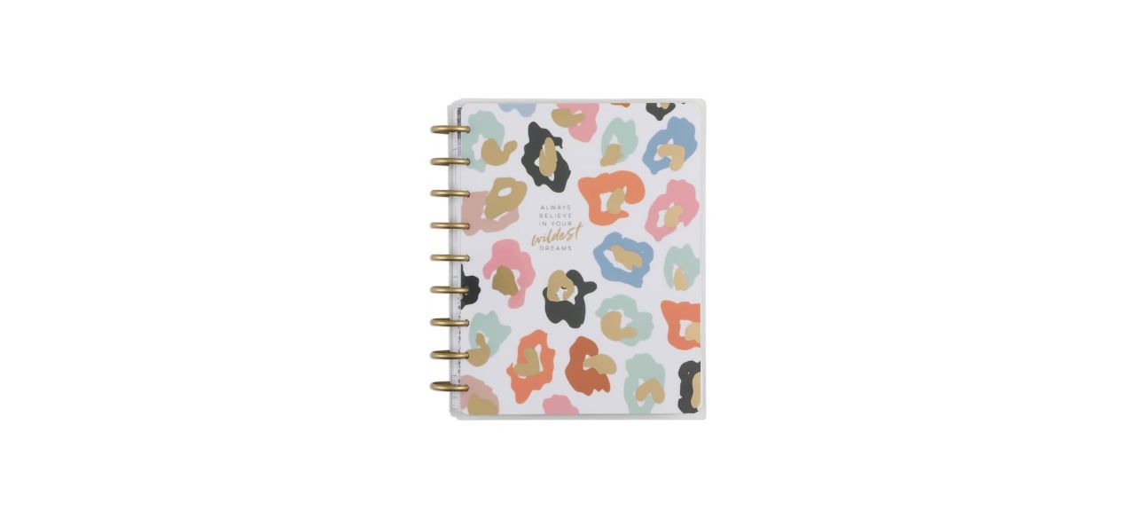 A white planner with colorful blobs on it