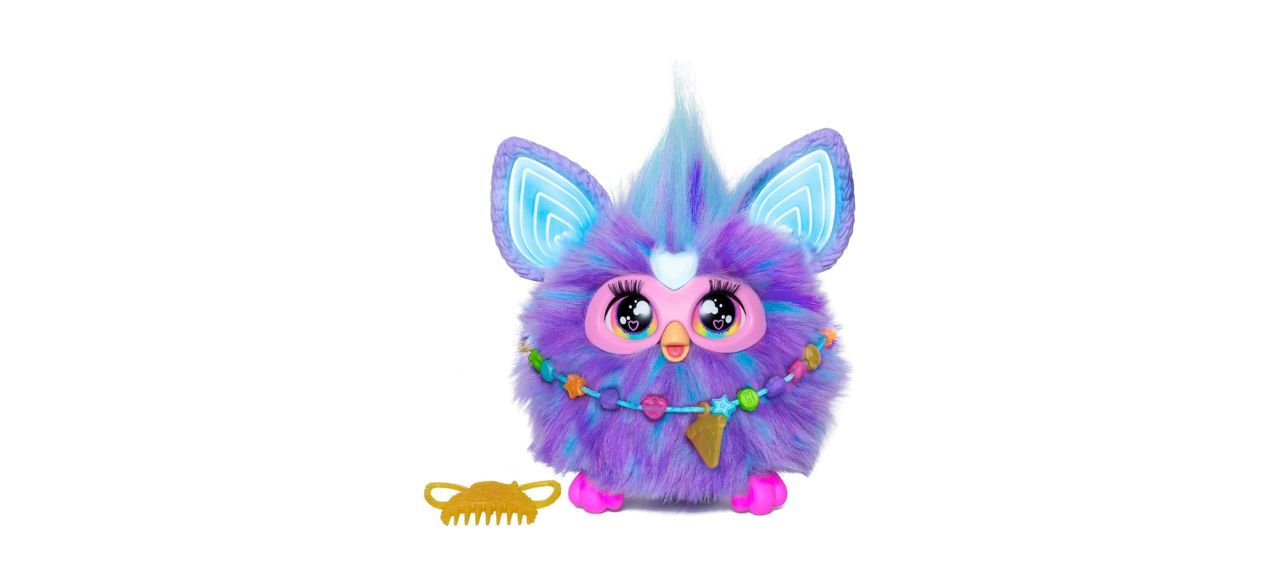 Blue and purple furby with comb on white background