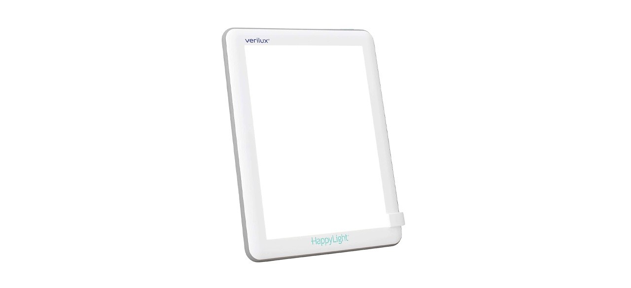 A rectangular shaped white light with a white frame