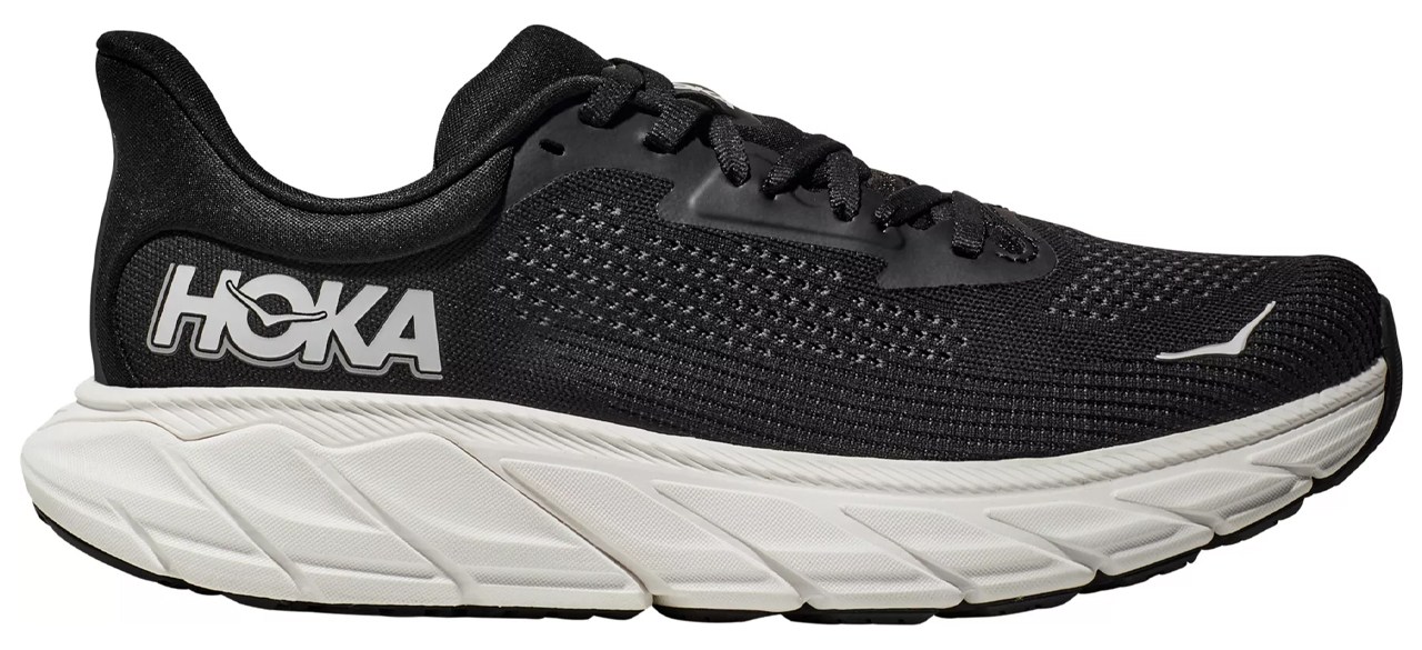 A black and white Hoka sneaker.