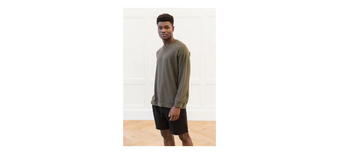 man wearing Cozy Earth Men's Ultra-Soft Bamboo Pullover Crew in hunter green color