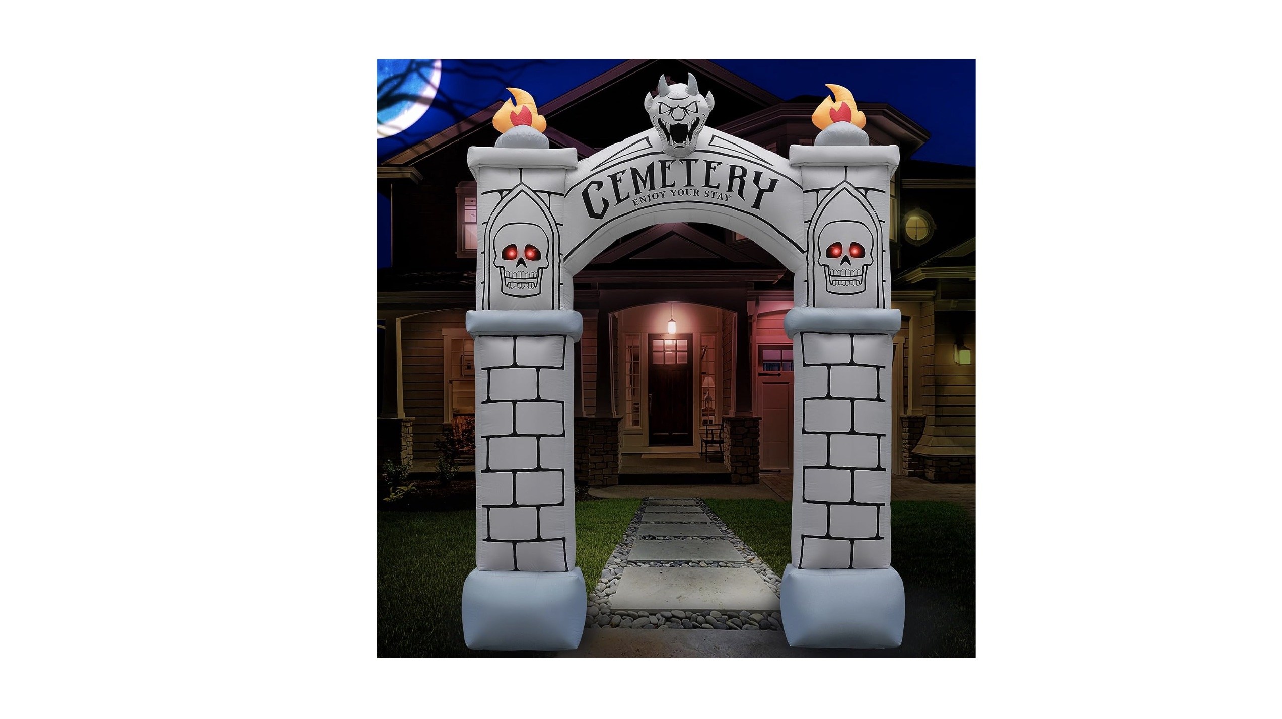 An inflatable archway that looks like it is made of bricks and has the word "cemetery" on it