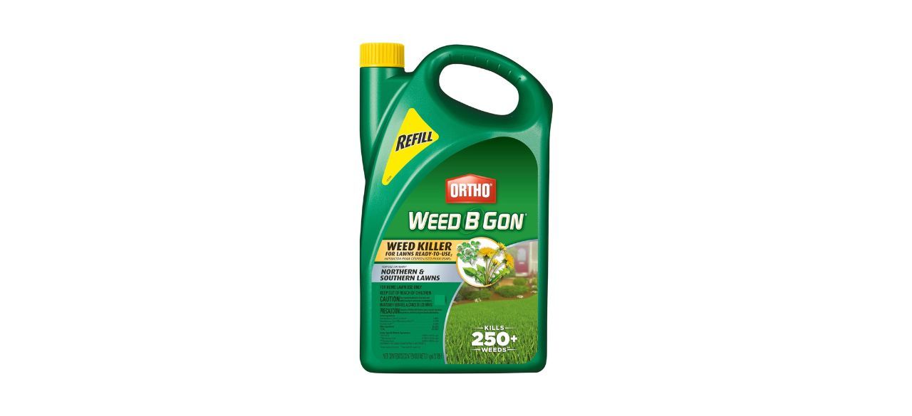 A large green bottle of weed killer. Packaging indicates that it is ready to use and works on most northern and southern lawns.