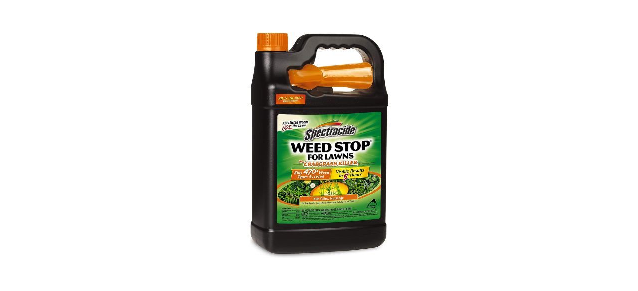 A black and orange bottle of weed killer with a sprayer on it. Packaging indicates it kills crabgrass and yellow nutsedge