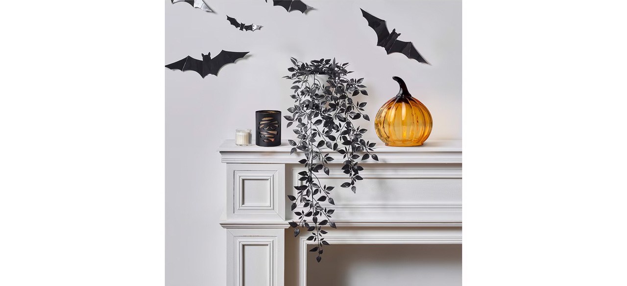  Glass pumpkin on mantel with Halloween decor