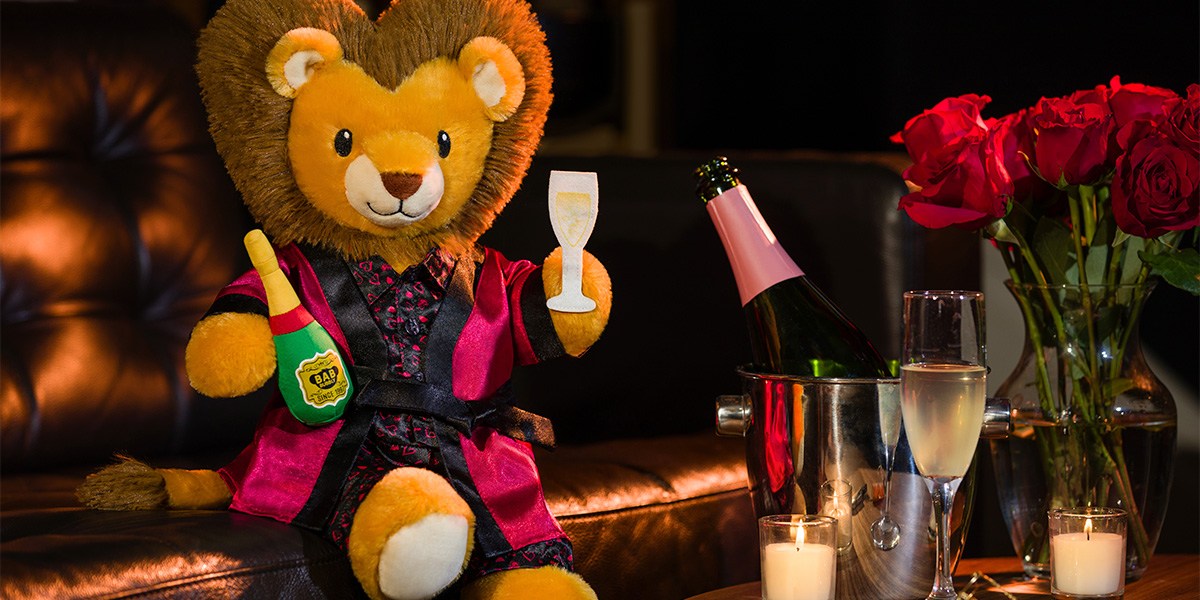 Build-a-Bear Lion with champagne bottle and glass