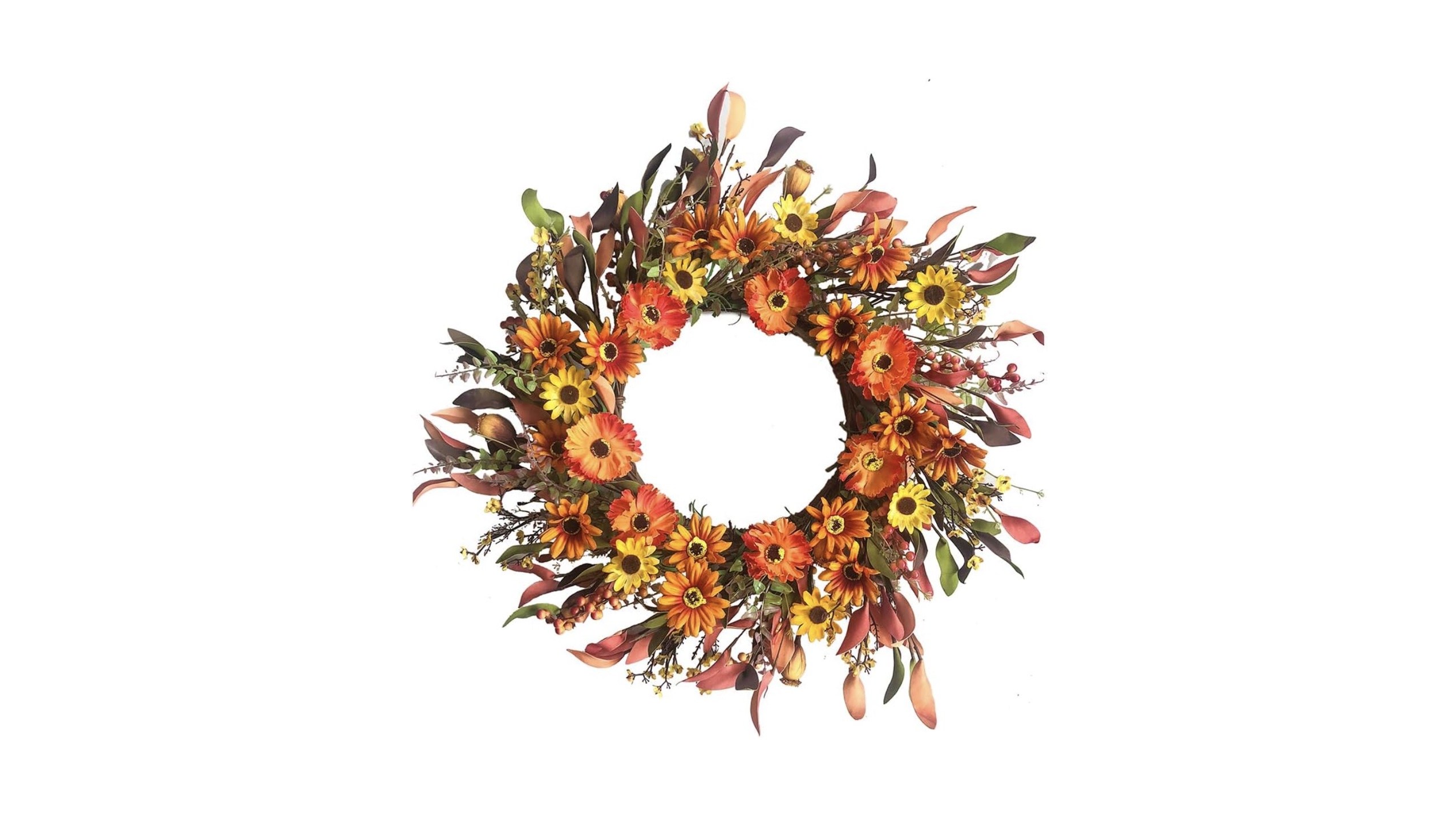 A wreath with orange and yellow flowers and assorted greenery