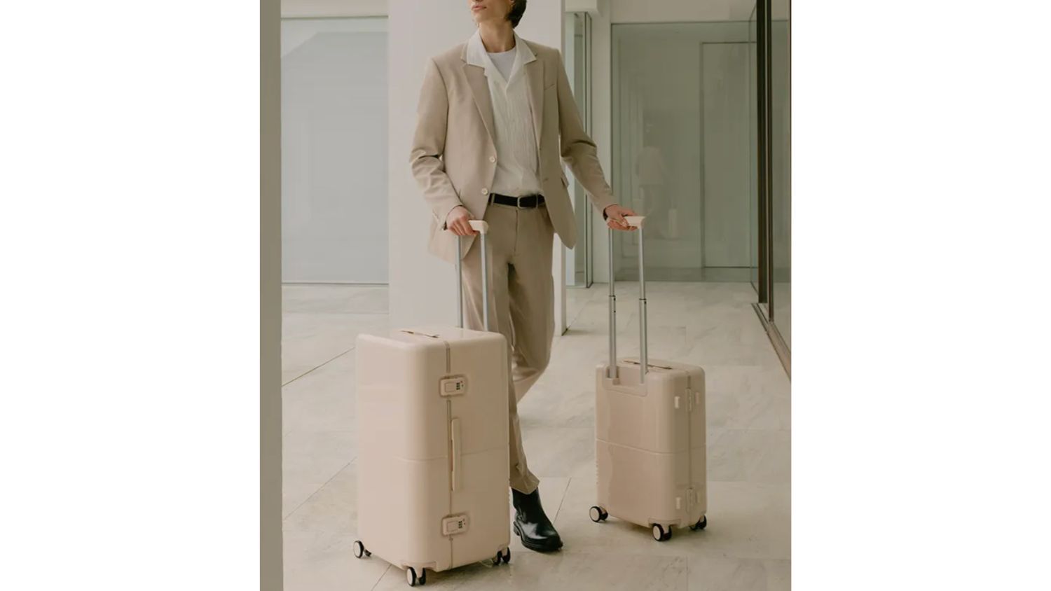 Man walking with luggage outside