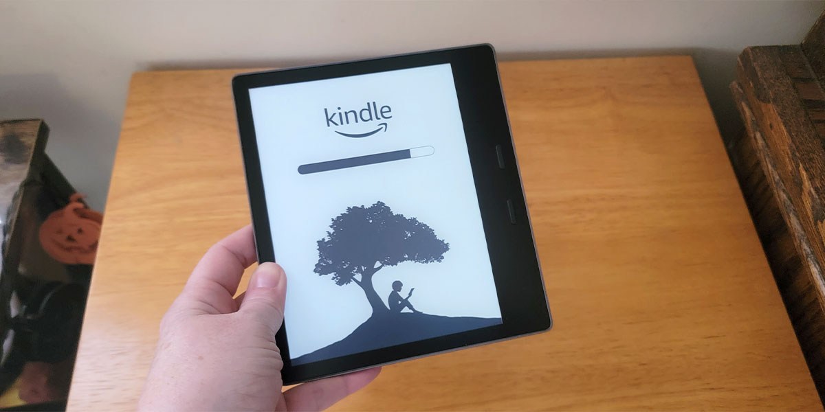 Hand holding Kindle Oasis