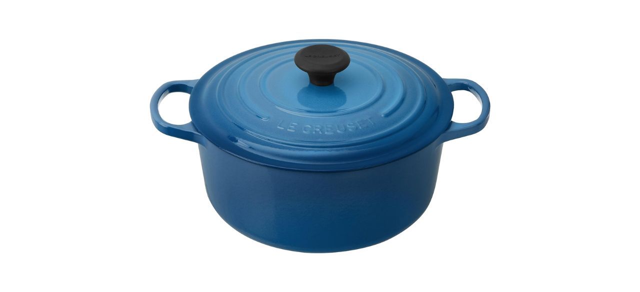 a blue enameled cast-iron dutch oven with a lid