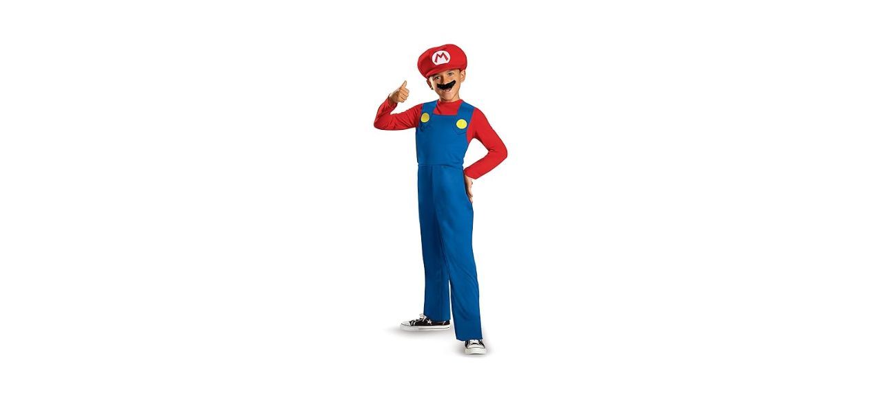 boy wearing Nintendo Super Mario costume doing 