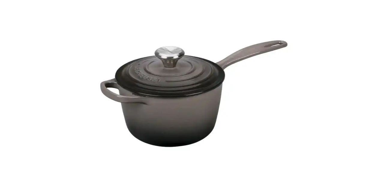 Le Creuset Signature 1.75-Quart Enameled Cast Iron Saucepan in the color "oyster," which is a dark grayish black