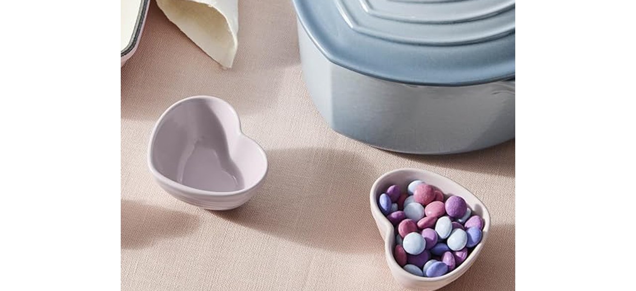 Le Creuset Stoneware Mini Heart Bowls, Set of 4, Mixed Color Set with candies on table