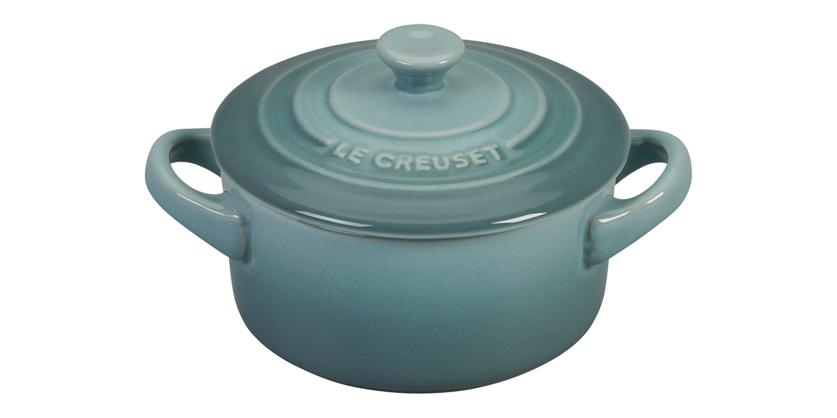 le creuset mini cocotte sea foam color on white background