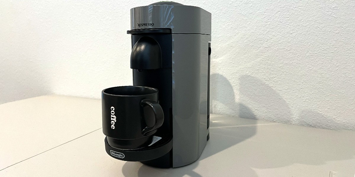 Black Nespresso VertuoPlus Deluxe by De’Longhi on countertop