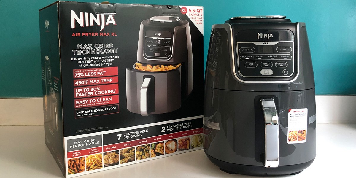 Ninja Air Fryer Max XL on countertop next to branded product packaging