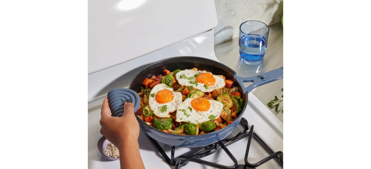 Blue Our Place Cast Iron Cookware Set on stovetop